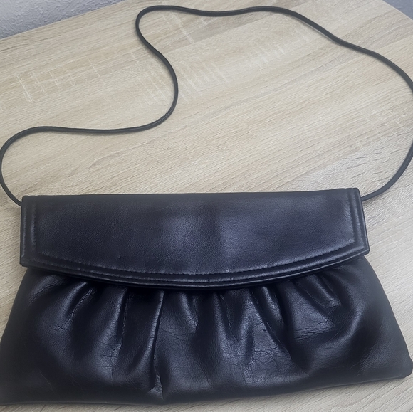 None Handbags - Black‎ clutch. No name brand.
